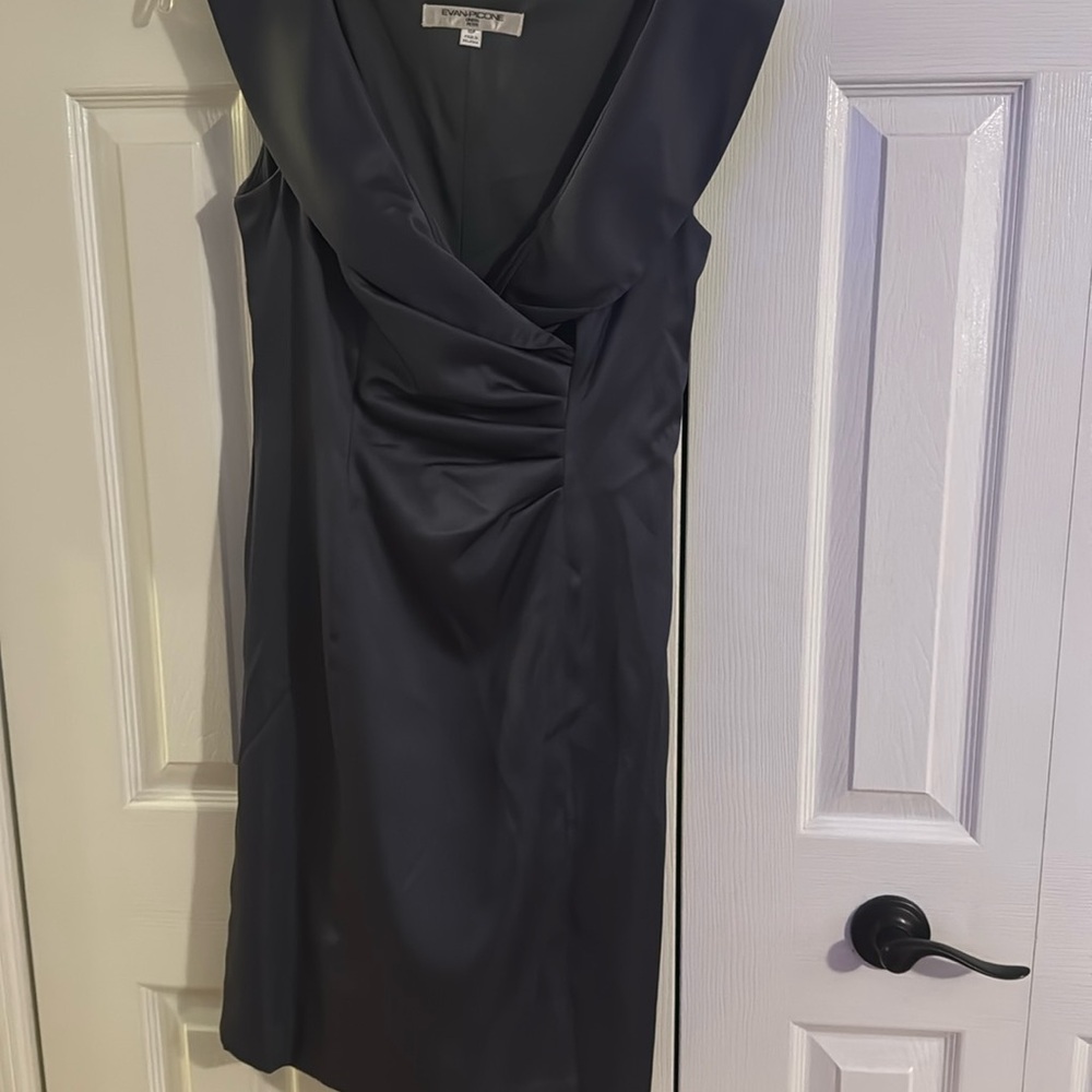 Sleeveless grey dress. Great for office or a night out.